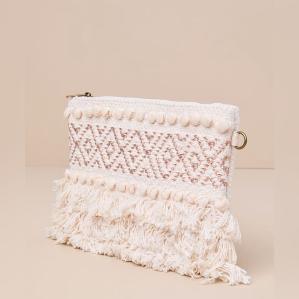 Lulu’s cream and rose gold clutch